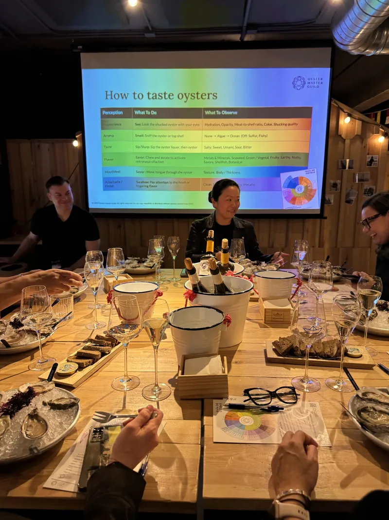 Participants at an oyster tasting event.