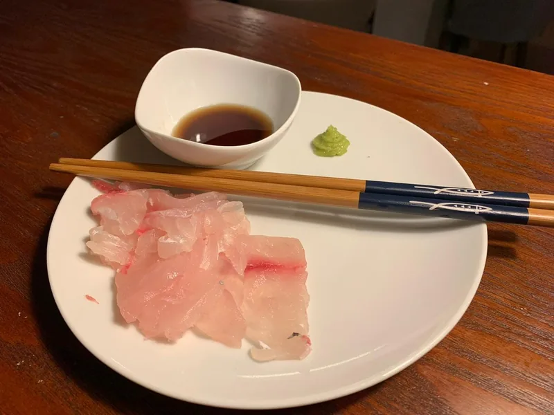 A plate with sushi red drum.