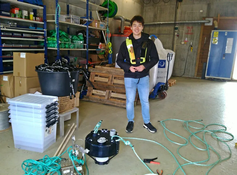 A student working on underwater microscopes in the workshop.