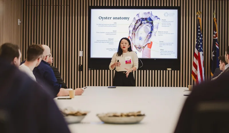 A woman delivering a presentation.