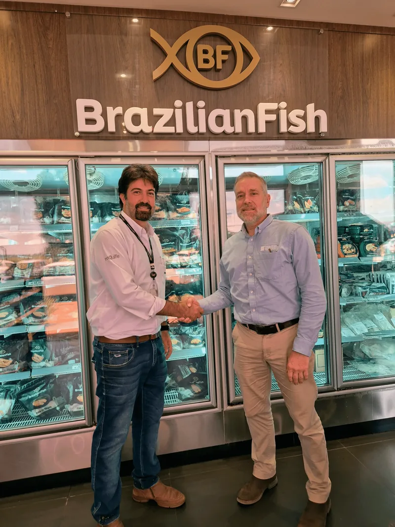 Two men shaking hands.